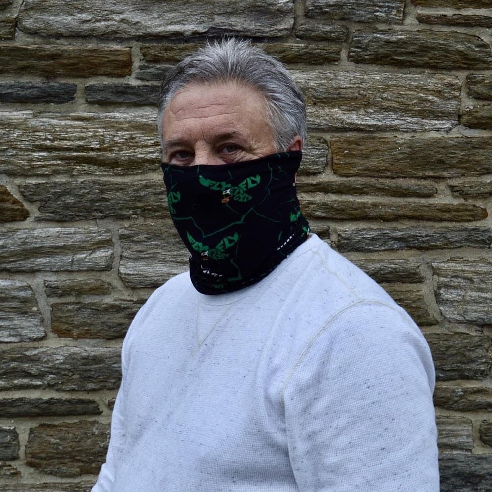 Adult male wearing a Philadelphia football face cover by Jolina Boutique