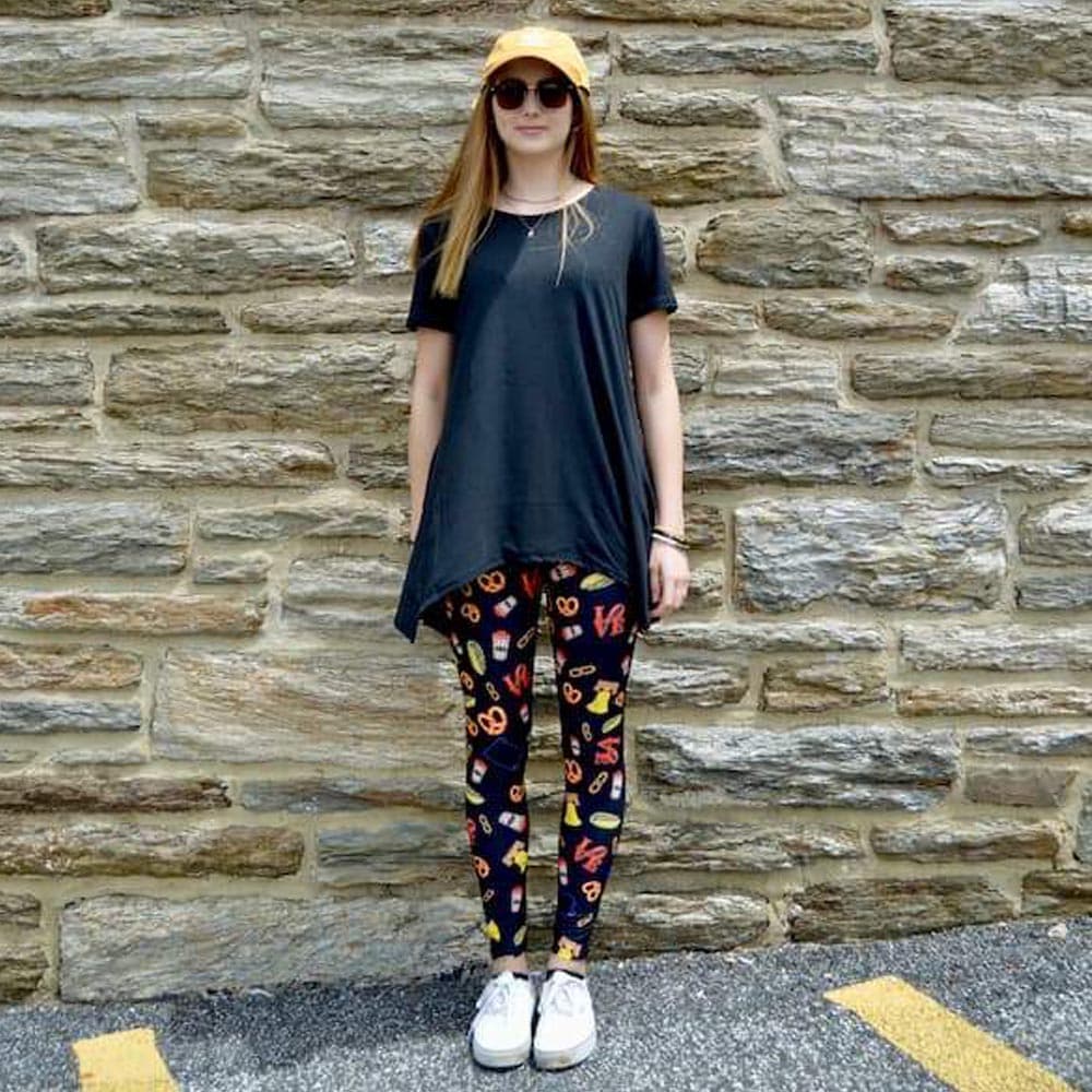 Model wearing Philly LOVE pattern leggings by Jolina Boutique