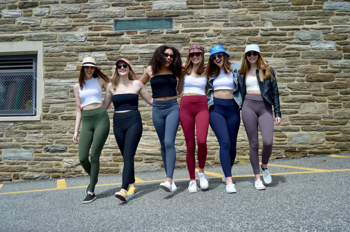 Several colored solid leggings sold by Jolina Boutique