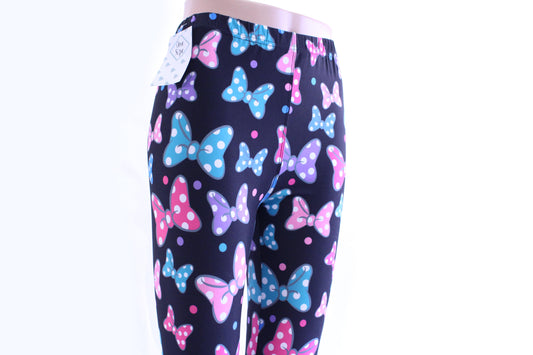 Who doesn't love Minnie!? Tap into your inner Minnie with these animated bowtie leggings by Jo Lina Boutique