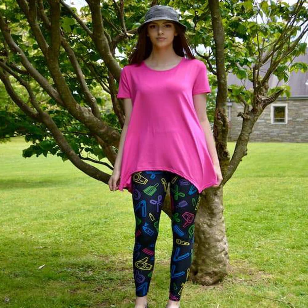 Model wearing sassy stylist pattern leggings by Jolina Boutique
